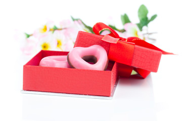 pink heart cookies  for valentines day in red gift, on white bac