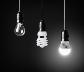 Light bulb,energy saver bulb and LED bulb on black