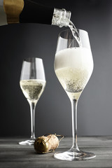 Wall Mural - Champagne being filled into Glasses