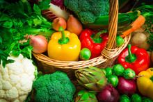 Mix Of Season Vegetables In Wicker Basket