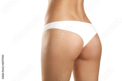 Fotografie, Obraz Closeup of a beautiful woman showing perfect buttocks