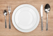 © karandaev - Empty plate and silverware set
