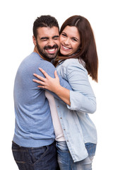 Wall Mural - Couple posing over white background