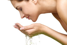 Beautiful Woman Refreshing Her Face With Water