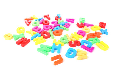 Colorful magnetic letters isolated on white