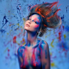 Wall Mural - Young woman muse with creative body art and hairdo