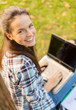 © Syda Productions - smiling teenager with laptop