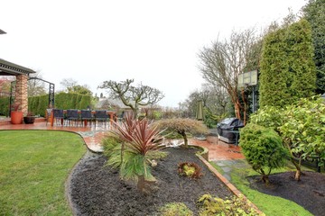 Beautiful spring backyard garden after rain