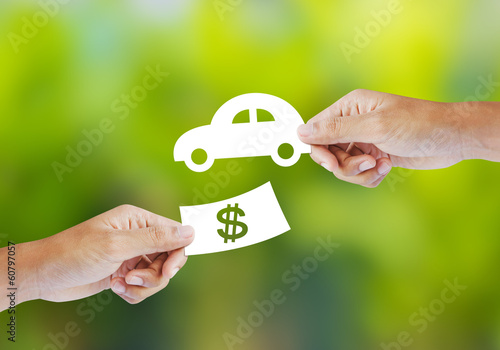 Fotografía Hand with paper money and car shape. new car buy concept