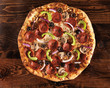 over head view of pizza with supreme toppings