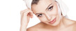 © vladimirfloyd - smiling beautiful girl with a towel on her head posing on white