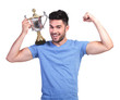 © Viorel Sima - man flexing his muscle and holding a trophy cup