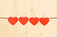 Four Decorative Red Hearts Hanging, Concept Of Valentine Day