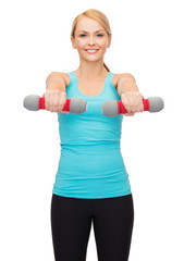 Sticker - young sporty woman with light dumbbells