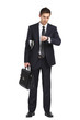 © Karramba Production - Full-length portrait of businessman handing briefcase