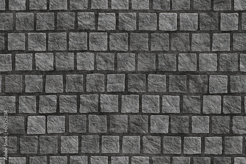 Cuadros en Lienzo Granite cobblestoned pavement background.