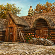 Drewniana chatka ze słomianym dachem