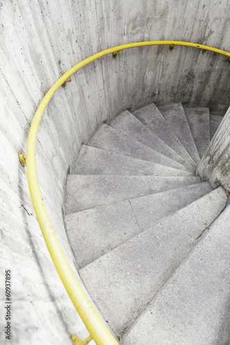 Naklejka na drzwi Spiral staircase in the city