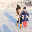 © travnikovstudio - Happy excited little girl and her young mother learning