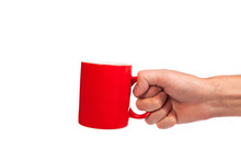 Male Hand Is Holding A Red Cup