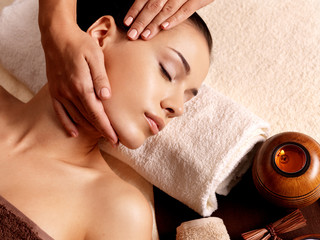 Woman having massage in the spa salon