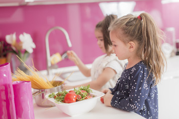 Wall Mural - Little girls in the kitchen