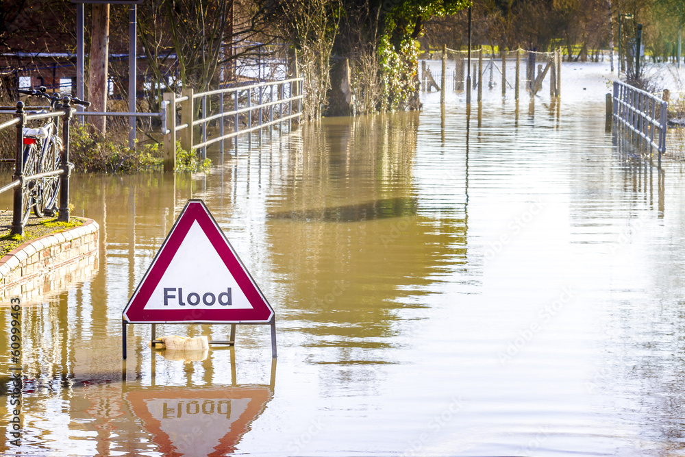 Flooded Road and Sign Stock Photo | Adobe Stock