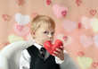 © natalinka29 - Little boy with red Heart in hands. Valentines Day concept.