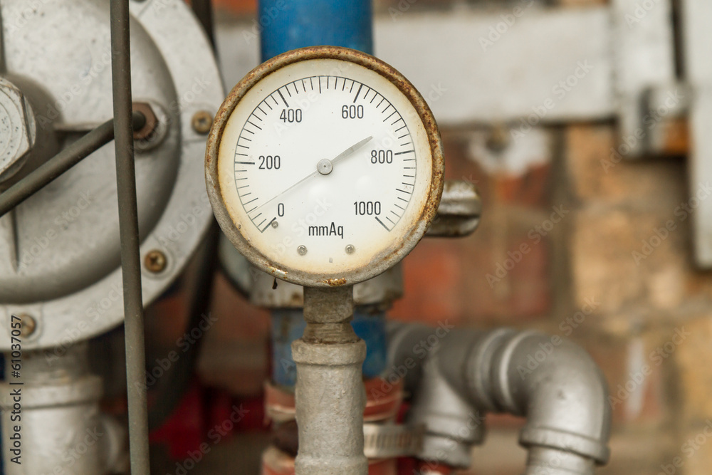 Pressure Gauge connected to Pipes Stock Photo | Adobe Stock