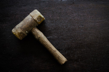 hammer on wood background