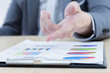 © Nonwarit - Businessman's hand showing financial report