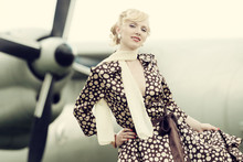 Vintage Stylized Photo Of Beauty Girl And Plane