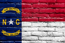 North Carolina State Flag Painted On Brick Wall