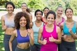 © WavebreakmediaMicro - Happy female friends jogging in park
