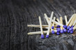 © Costin79 - A lot of matchstick on a textured wood background