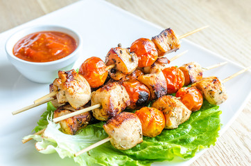 Wall Mural - Grilled chicken skewers with cherry tomatoes