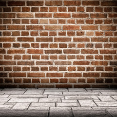 Red brick wall and brick floor interior