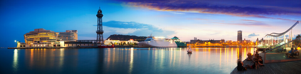  panorama of Port Vell in sunset. Barcelona