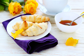 Canvas Print - croissants with honey for breakfast