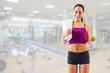 © Boris Riaposov - Young girl with apple at gym club