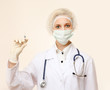 © lenets_tan - Medical doctor with syringe, isolated on white background.