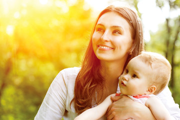 beautiful mother and baby outdoors. nature