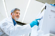 © lightpoet - Senior male researcher carrying out scientific research in a lab