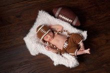 Newborn Baby Boy In Football Outfit