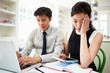 © Monkey Business - Worried Asian Couple Looking At Personal Finances