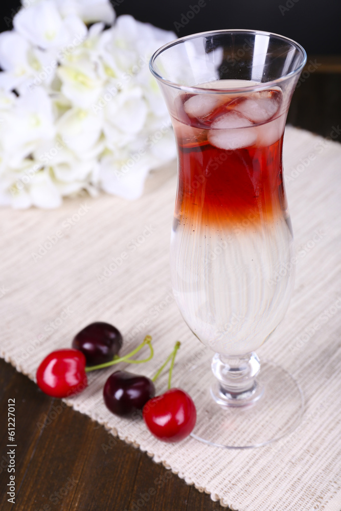 Glass of cocktail on table close-up