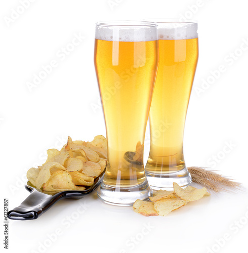 Fototapeta na wymiar Glasses of beer with snack isolated on white