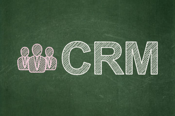 Business concept: Business People and CRM on chalkboard