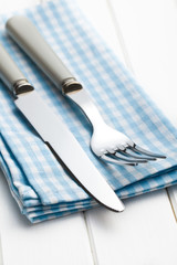 Wall Mural - fork and knife on checkered napkin