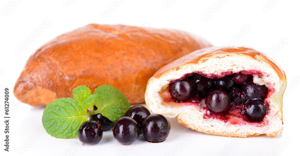 Fresh baked pasties with currant isolated on white